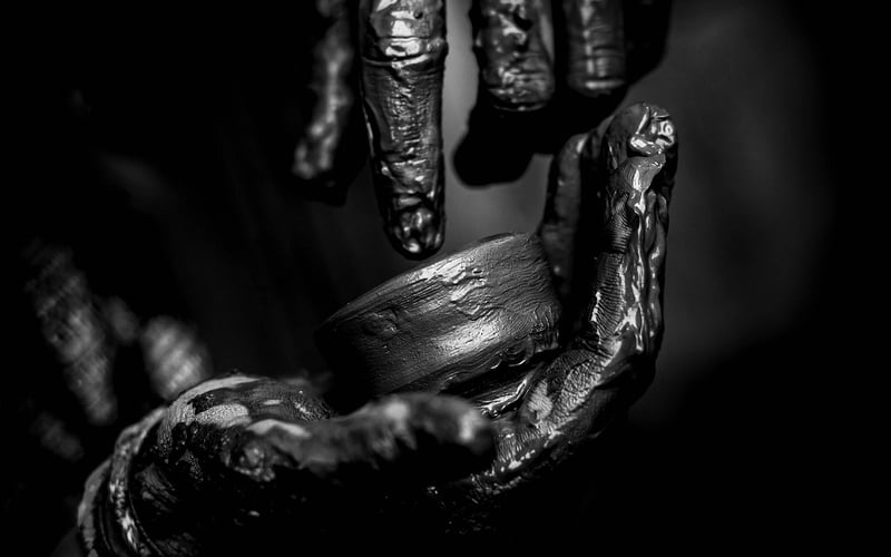 Hand holding a light bulb representing ideas and innovation